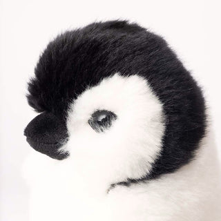 Détail d'une tête de peluche pingouin, haut de gamme, fabriqué en Italie, La Pelucherie